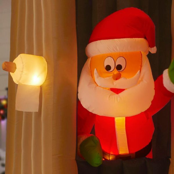 Christmas-animated inflatable santa coming out of the house
