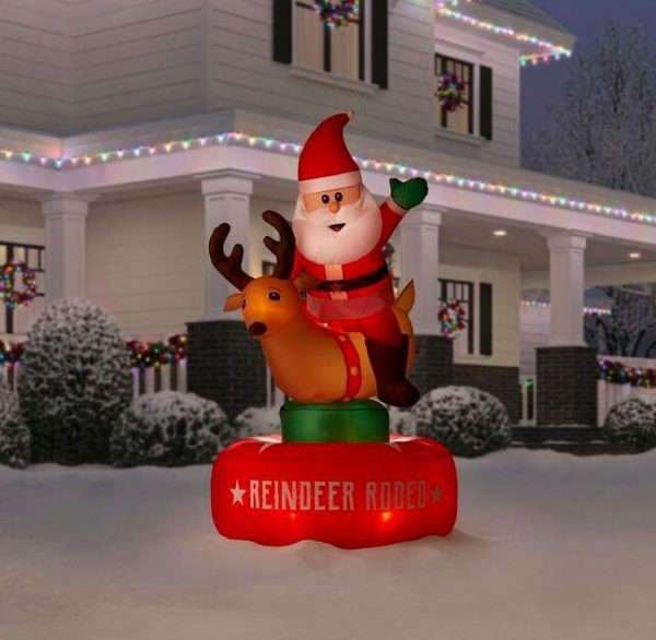 Christmas-animated inflatable santa and reindeer rodeo scene